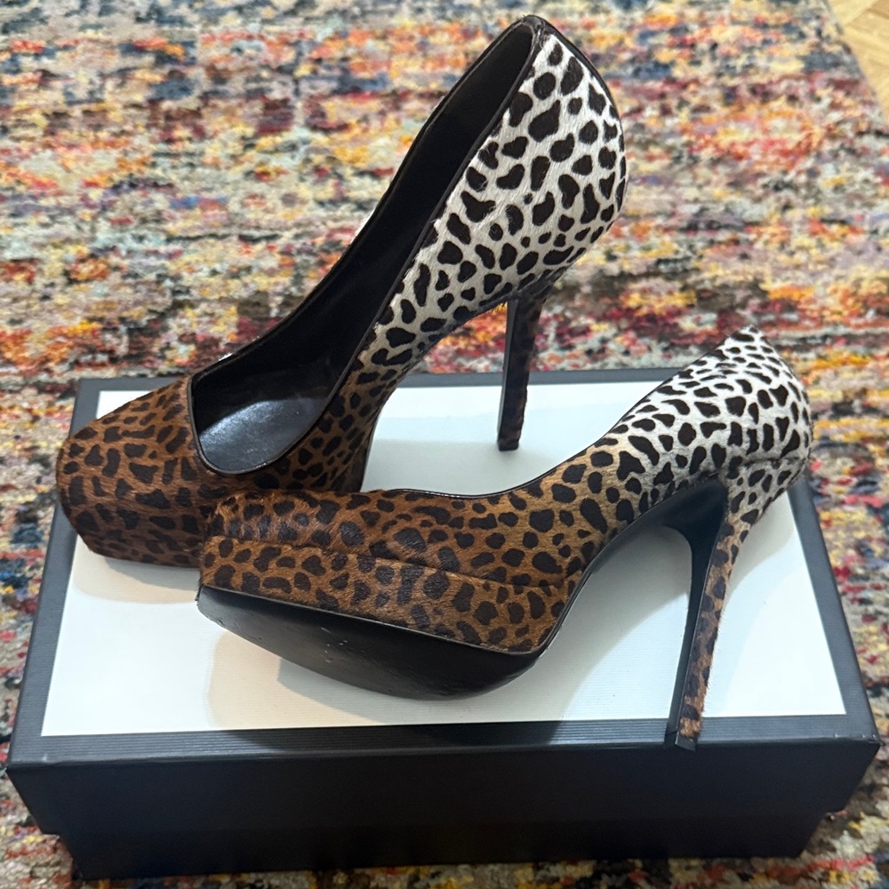 Gucci Leopard Print Pony Hair Platform Pumps.